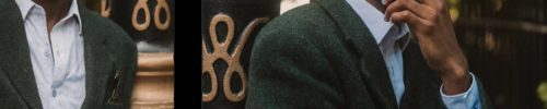A person wearing glasses from Vu, le plus grand inventaire de montures à Montréal, stands thoughtfully by a decorative black and gold pole, greenery in the background. They have short curly hair and one hand near their mouth.