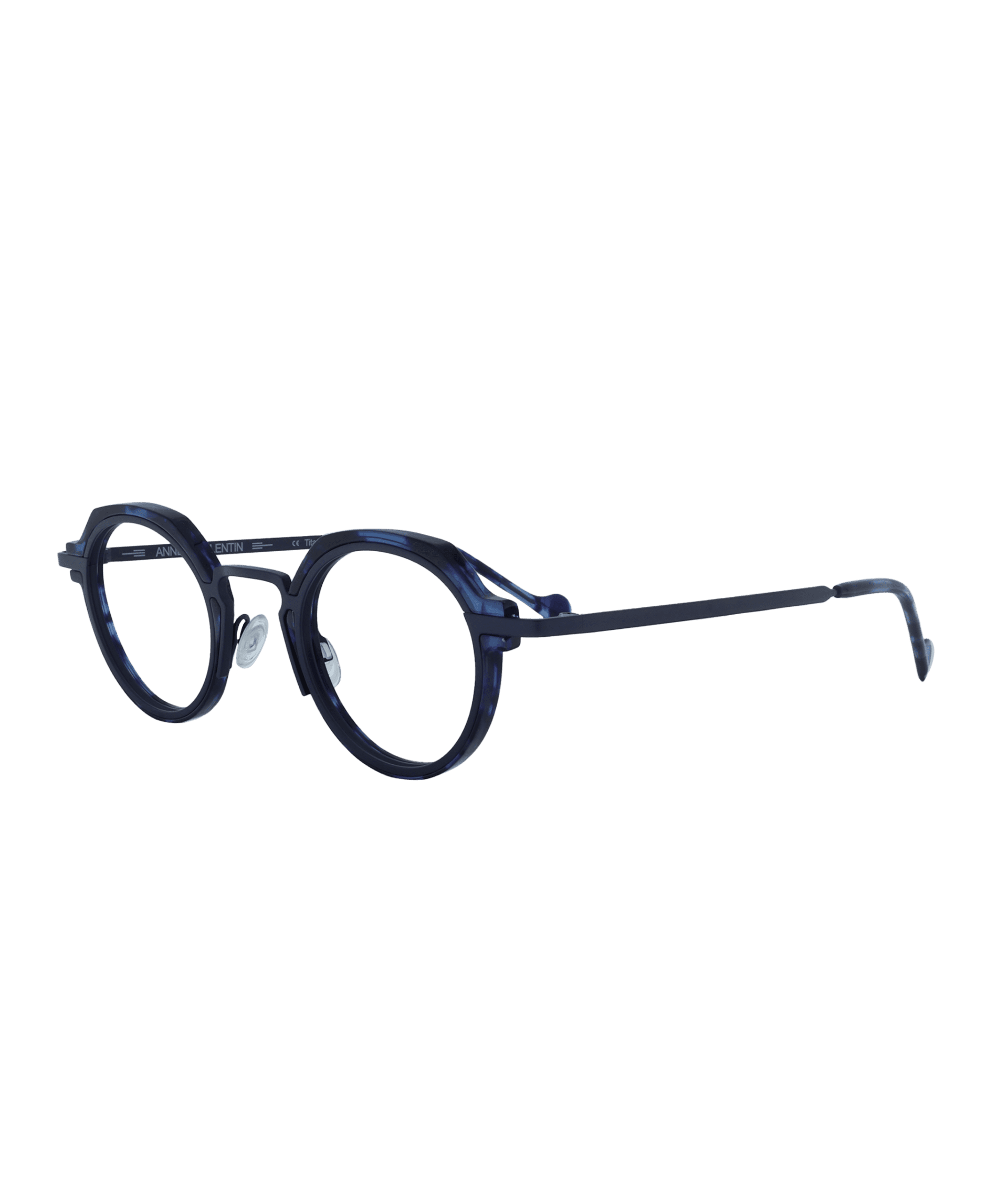This frame combines modernity and elegance with its subtly rounded shape crafted in plastic and metal, featuring refined nose pads for optimal comfort. Its deep blue hue adds intensity and sophistication to the gaze, while the harmonious lines create a bold and distinctive style.