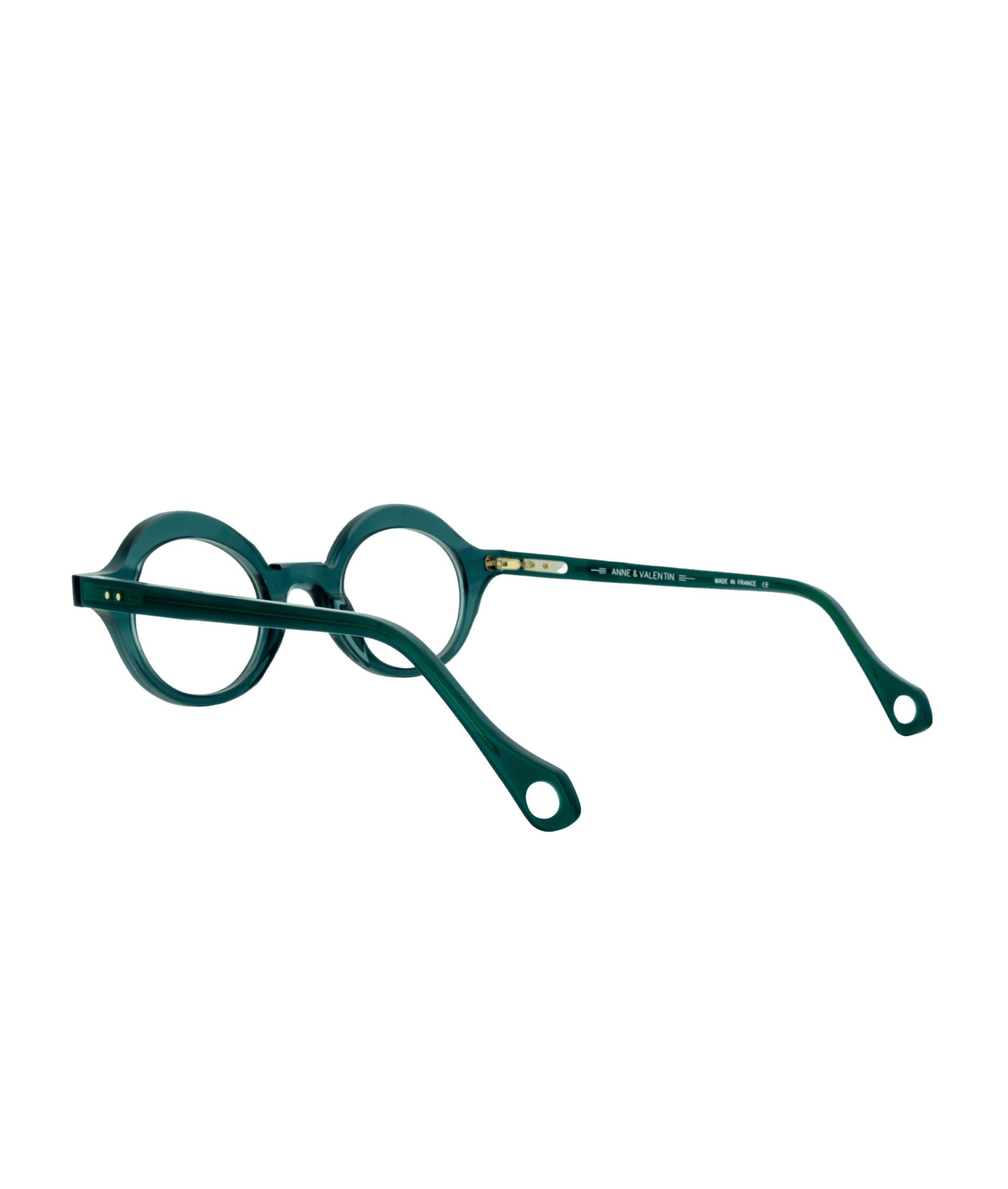 Monture immédiatement reconnaissable comme une création Anne et Valentin, avec sa silhouette arrondie et légèrement épaisse qui allie caractère et élégance. La belle couleur turquoise légèrement translucide met en valeur la forme iconique et apporte fraîcheur et modernité au regard.