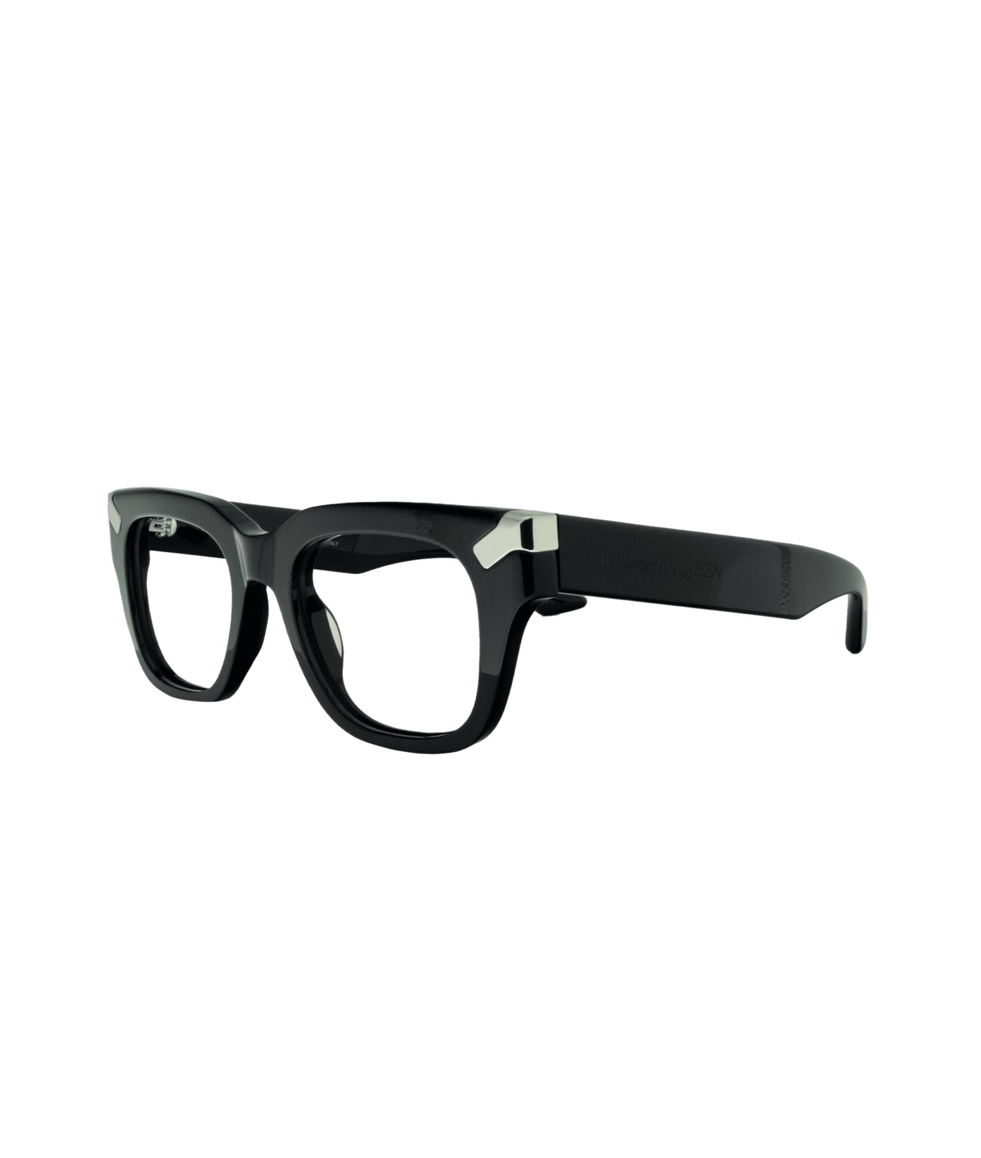 Impossible de passer inaperçu avec cette monture au design puissant et sculptural signée Alexander McQueen. Son cadre noir très massif affirme une présence forte et audacieuse, sublimée par des détails argentés aux coins qui apportent contraste et sophistication. Un modèle statement, idéal pour un look mode, assumé et résolument luxueux.